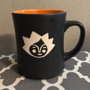 Starbucks 2011 Kenya Sun Mermaid Face Matte Black Orange Mug 16oz